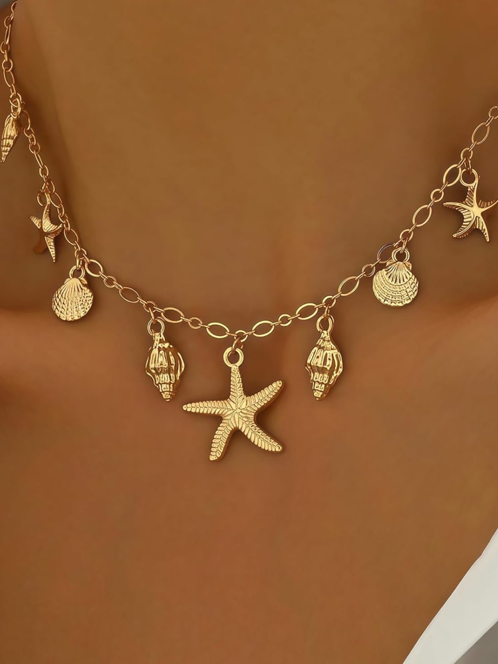 Anthropologie Gold Seashell & Starfish Charm Necklace
